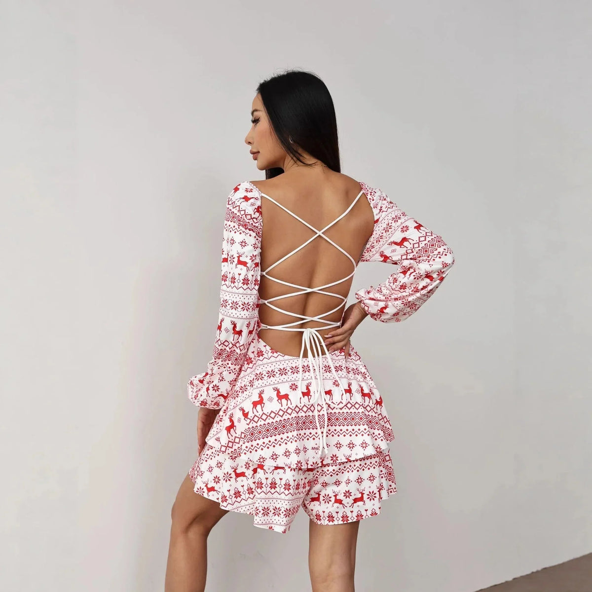 Women's A-Line Mini Dress featuring a vibrant printed design, long sleeves, and a flattering V-neckline, perfect for autumn styles. 3