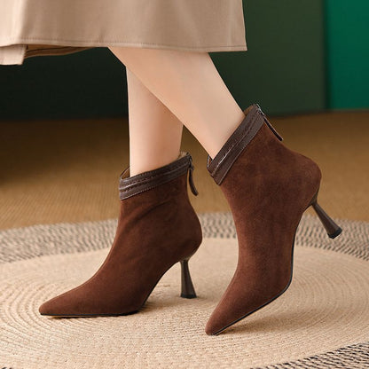 Women's black ankle boots featuring a supportive sole and a sleek comfort design, perfect for everyday wear. 1