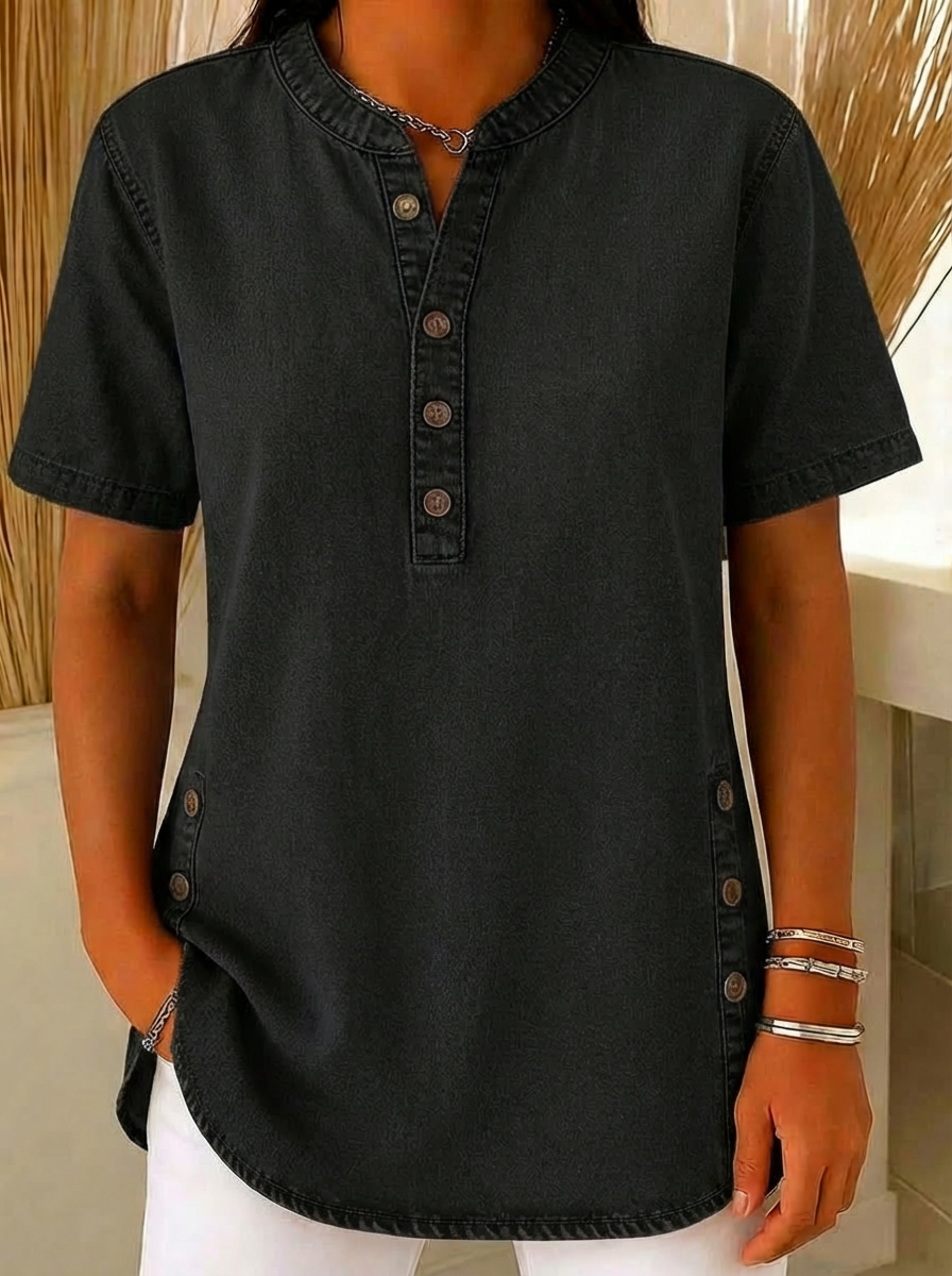 Women's relaxed fit blouse featuring a Henley neckline and short sleeves, made from a soft cotton blend for casual comfort and style. 2