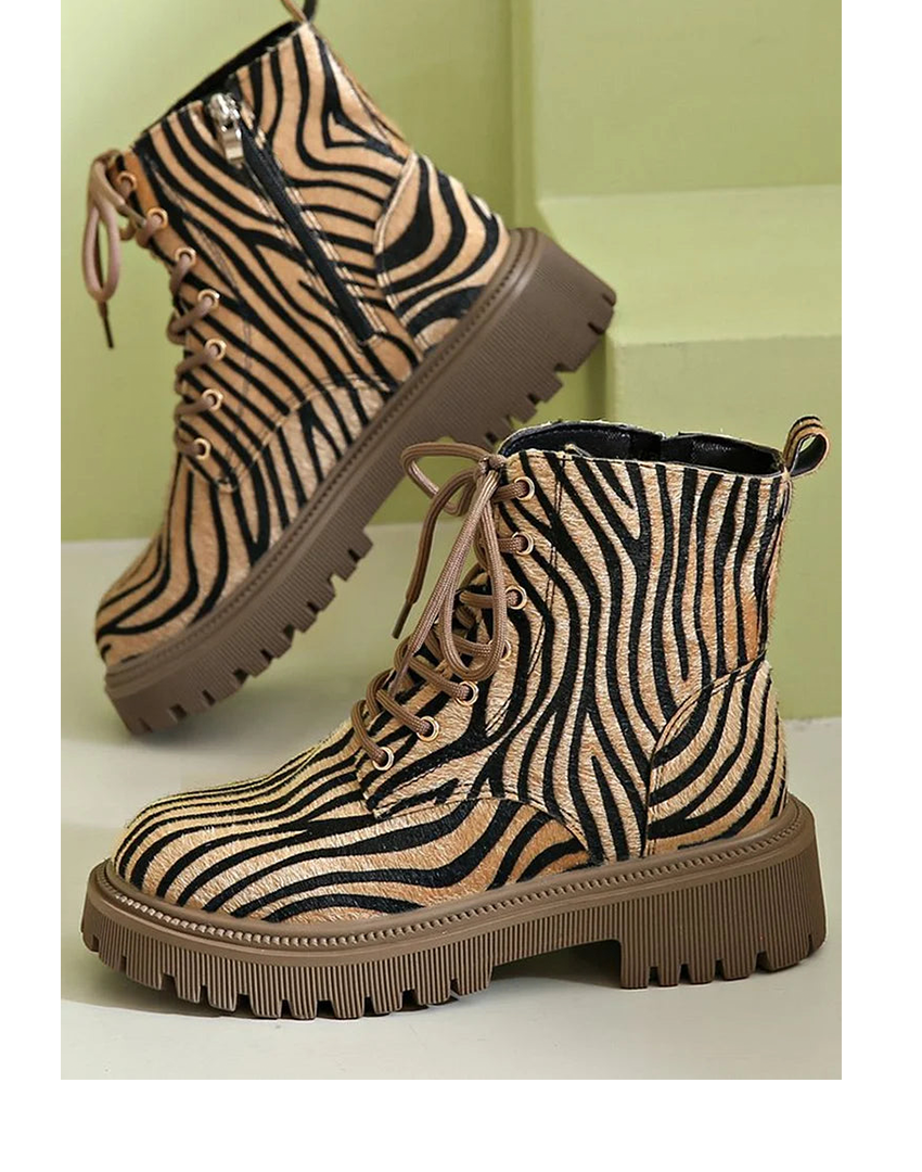 Women's zebra print khaki lace-up boots featuring a sleek silhouette, perfect for stylish and trendy fall and winter outfits. 0