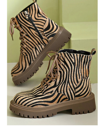 Women's zebra print khaki lace-up boots featuring a sleek silhouette, perfect for stylish and trendy fall and winter outfits. 0