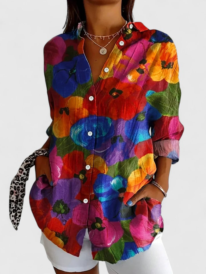 Women's button-up blouse featuring an artistic print, designed for versatility and elegance, perfect for both casual and formal occasions. 2