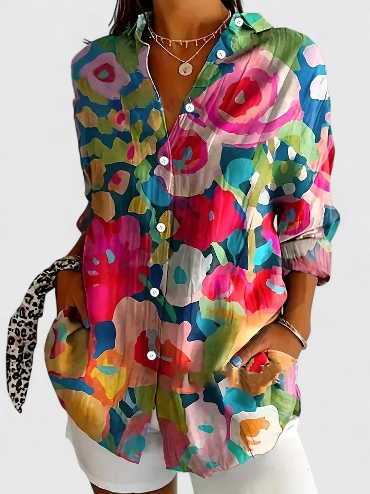Women's button-up blouse featuring an artistic print, designed for versatility and elegance, perfect for both casual and formal occasions. 3