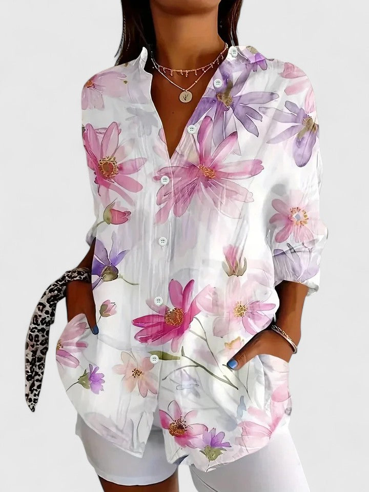 Women's button-up blouse featuring an artistic print, designed for versatility and elegance, perfect for both casual and formal occasions. 4