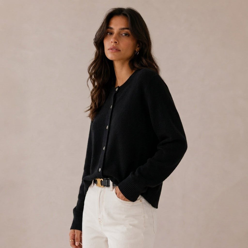 Women's cashmere cardigan featuring a button front and round neck, designed in a fitted style for versatile layering, perfect for both casual and formal occasions. 3