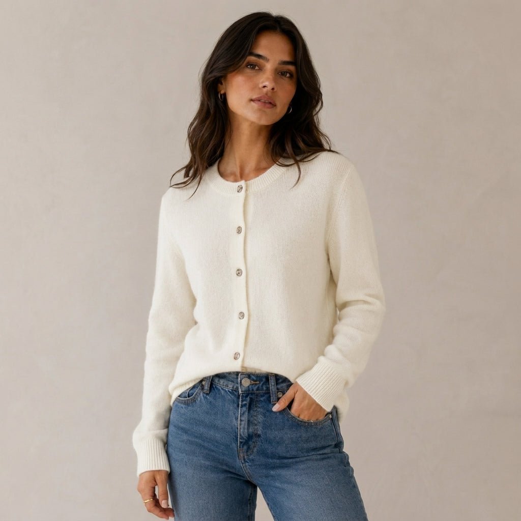 Women's cashmere cardigan featuring a button front and round neck, designed in a fitted style for versatile layering, perfect for both casual and formal occasions. 5