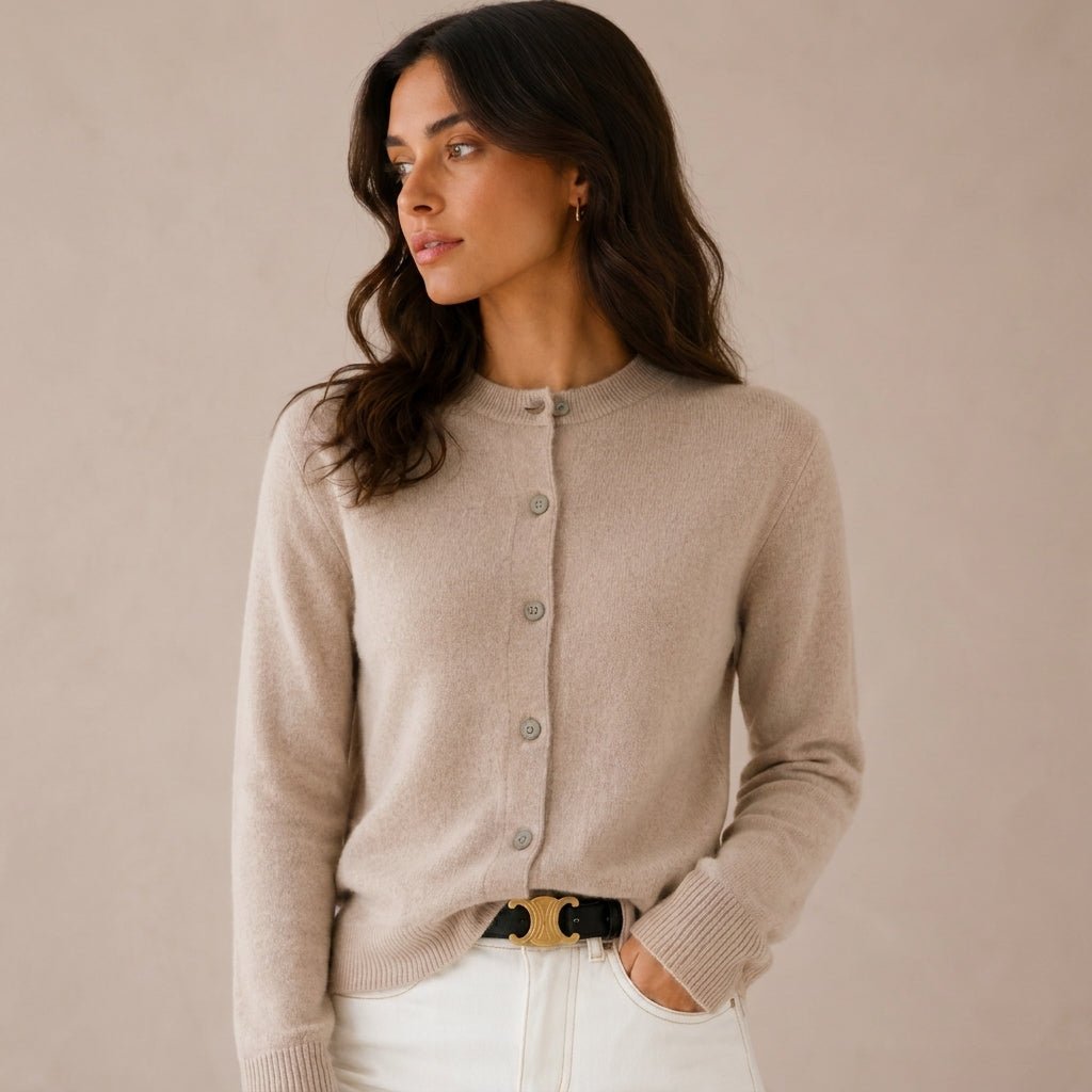 Women's cashmere cardigan featuring a button front and round neck, designed in a fitted style for versatile layering, perfect for both casual and formal occasions. 7