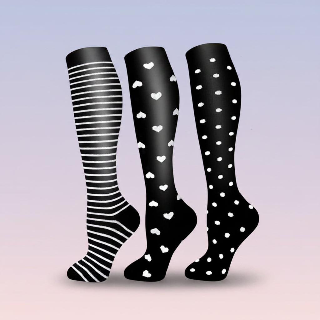 Women's compression socks designed for travel, featuring graduated support for enhanced circulation, breathable fabric for comfort, and a stylish design suitable for all-day wear. 0