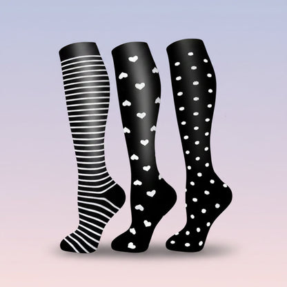 Women's compression socks designed for travel, featuring graduated support for enhanced circulation, breathable fabric for comfort, and a stylish design suitable for all-day wear. 0