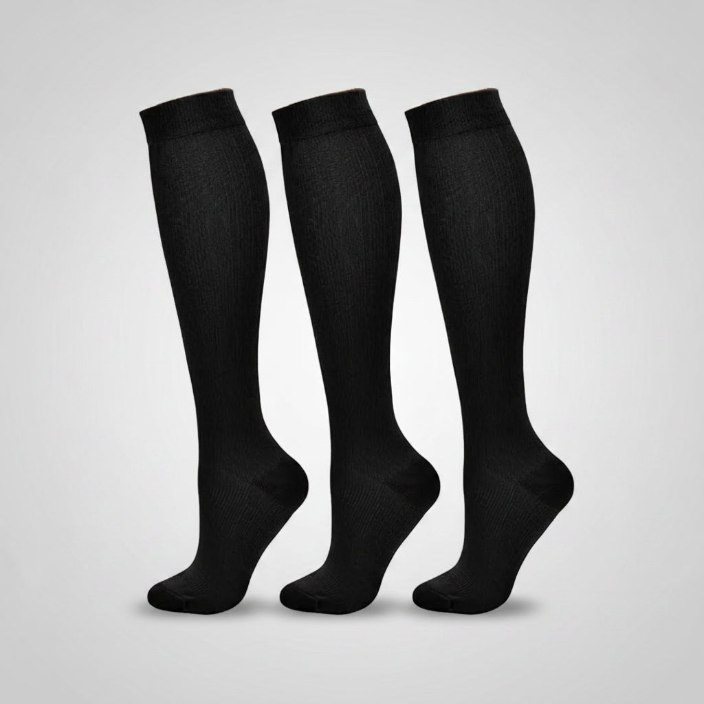 Women's compression socks designed for travel, featuring graduated support for enhanced circulation, breathable fabric for comfort, and a stylish design suitable for all-day wear. 1