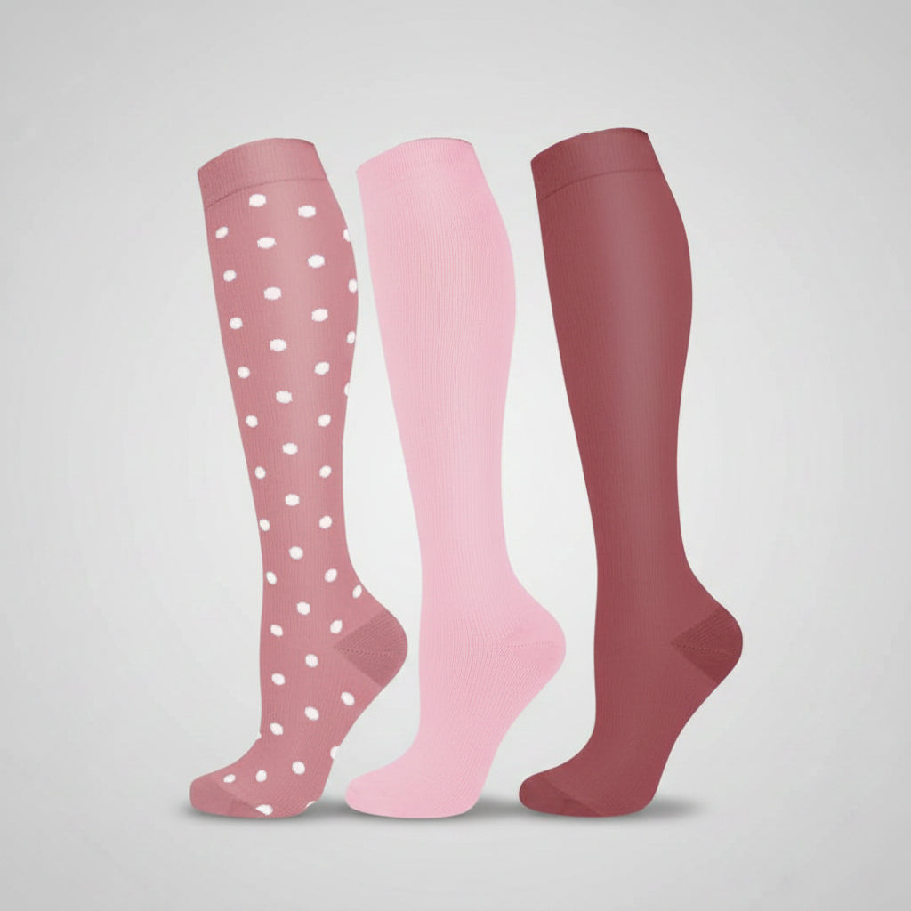Women's compression socks designed for travel, featuring graduated support for enhanced circulation, breathable fabric for comfort, and a stylish design suitable for all-day wear. 3