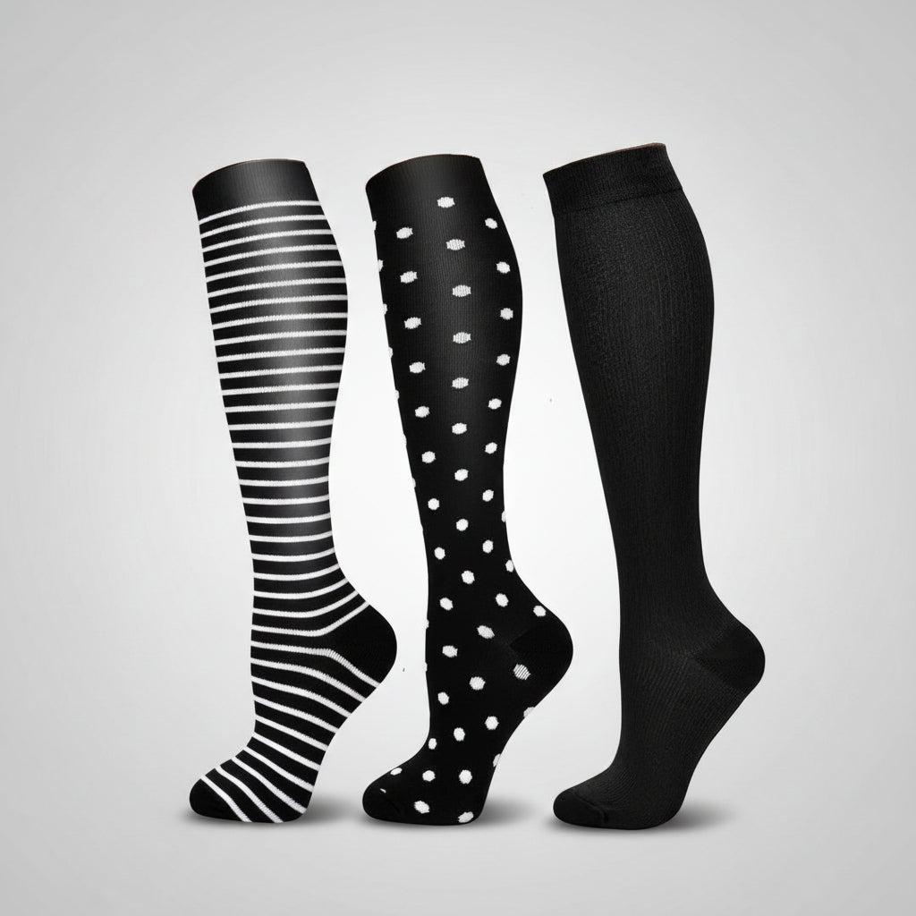 Women's compression socks designed for travel, featuring graduated support for enhanced circulation, breathable fabric for comfort, and a stylish design suitable for all-day wear. 4