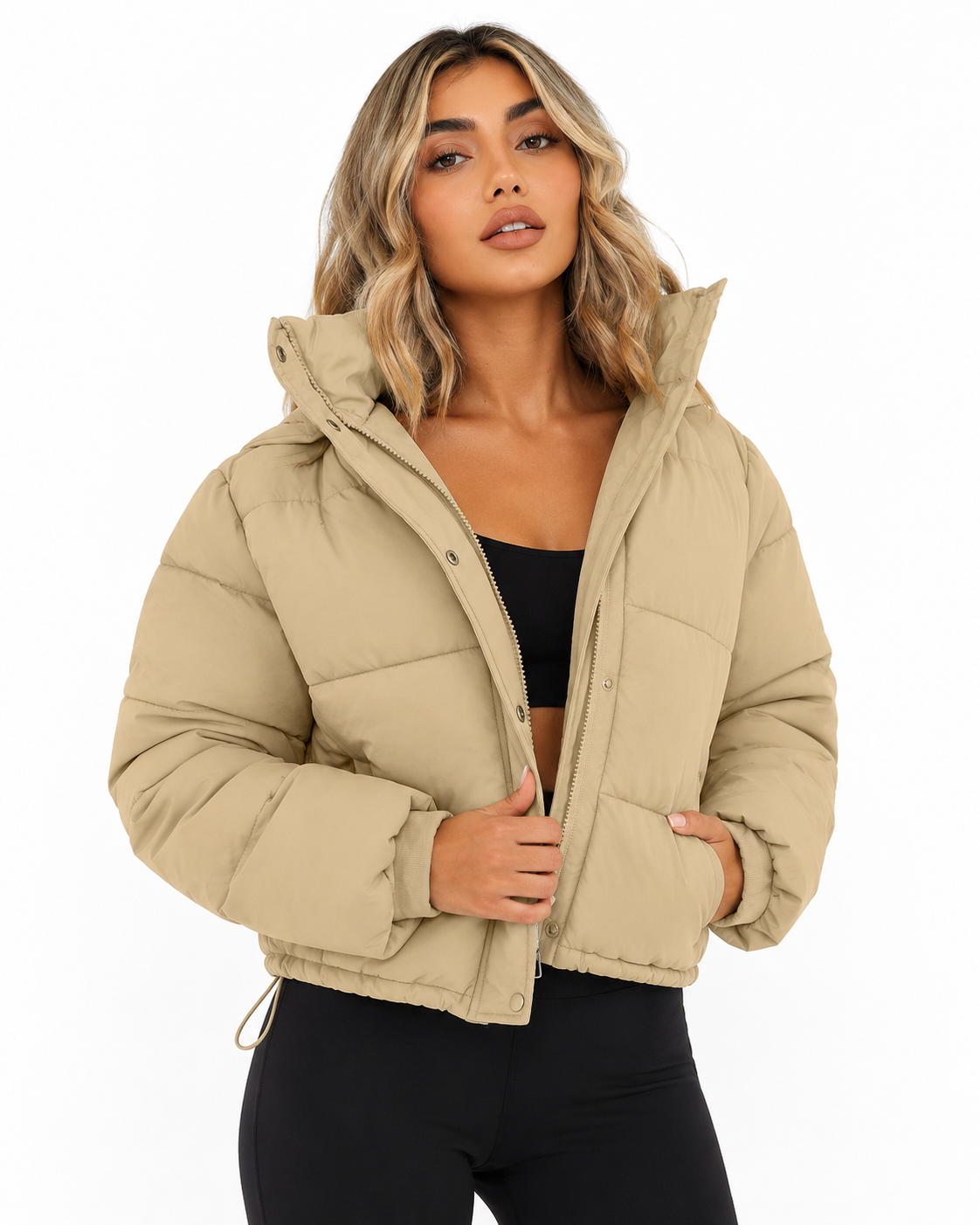 Women's cropped hooded puffer jacket featuring a zip closure and quilted insulated design, perfect for winter warmth and style. 2