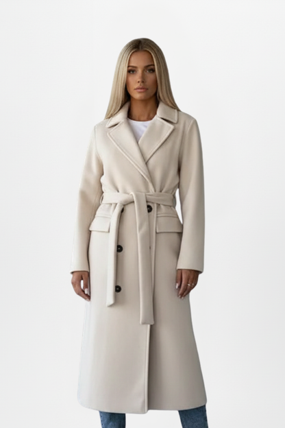 Women's double-breasted long coat featuring an adjustable waist belt, crafted from a warm polyester wool-blend, perfect for winter elegance and style. 0