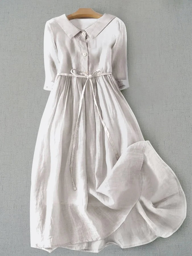 Women's cotton linen blend summer dress featuring a stylish lace-up waist design and elegant half sleeves, perfect for effortless elegance in warm weather. 1