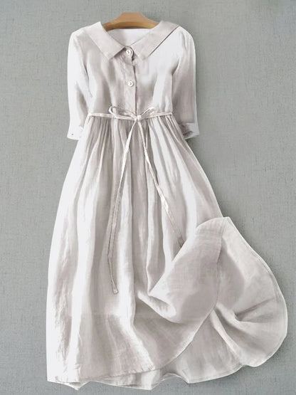 Women's cotton linen blend summer dress featuring a stylish lace-up waist design and elegant half sleeves, perfect for effortless elegance in warm weather. 1