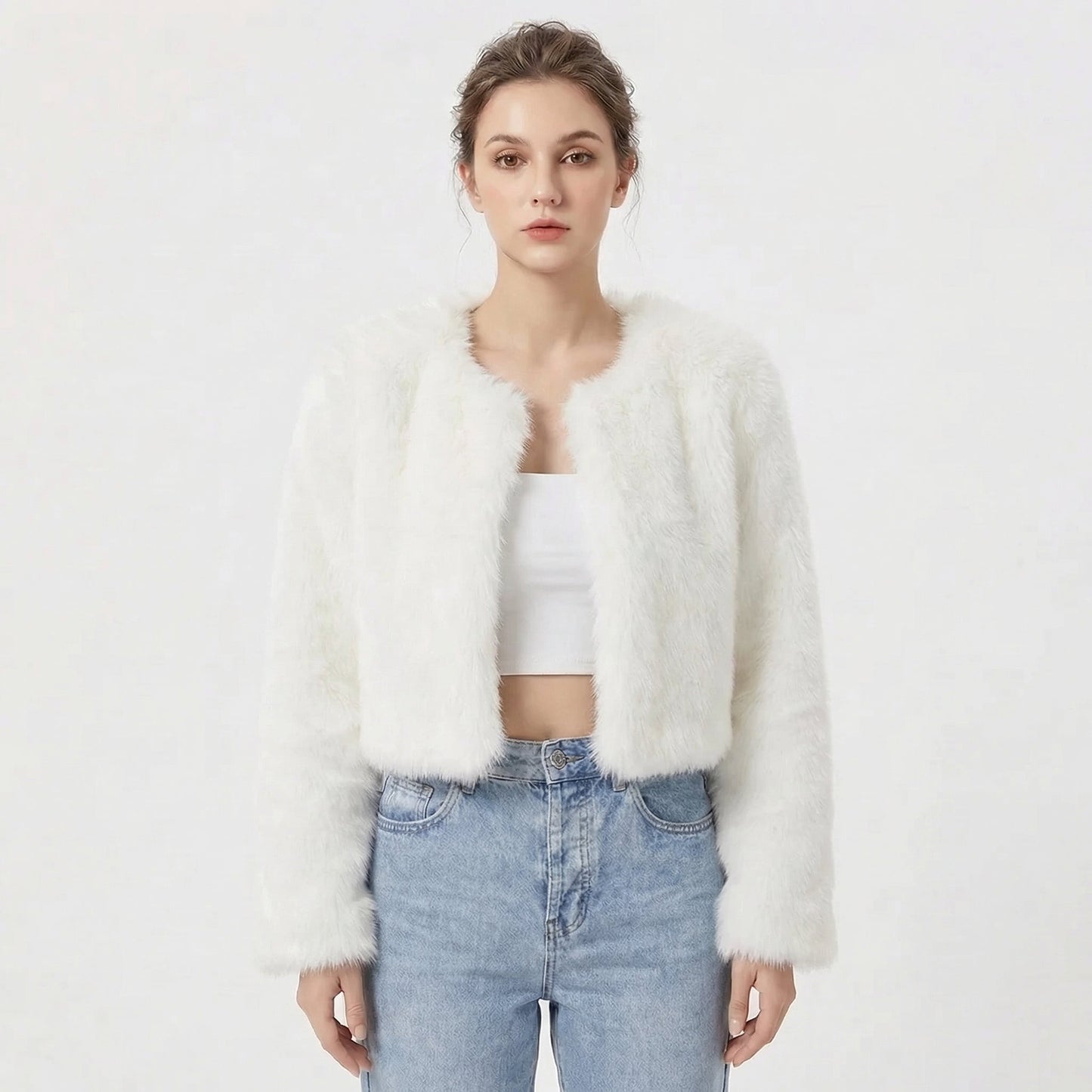Women's faux fur jacket featuring a stylish cropped silhouette, perfect for adding a soft, lightweight layer to winter outfits, ideal for elegant evening wear. 0