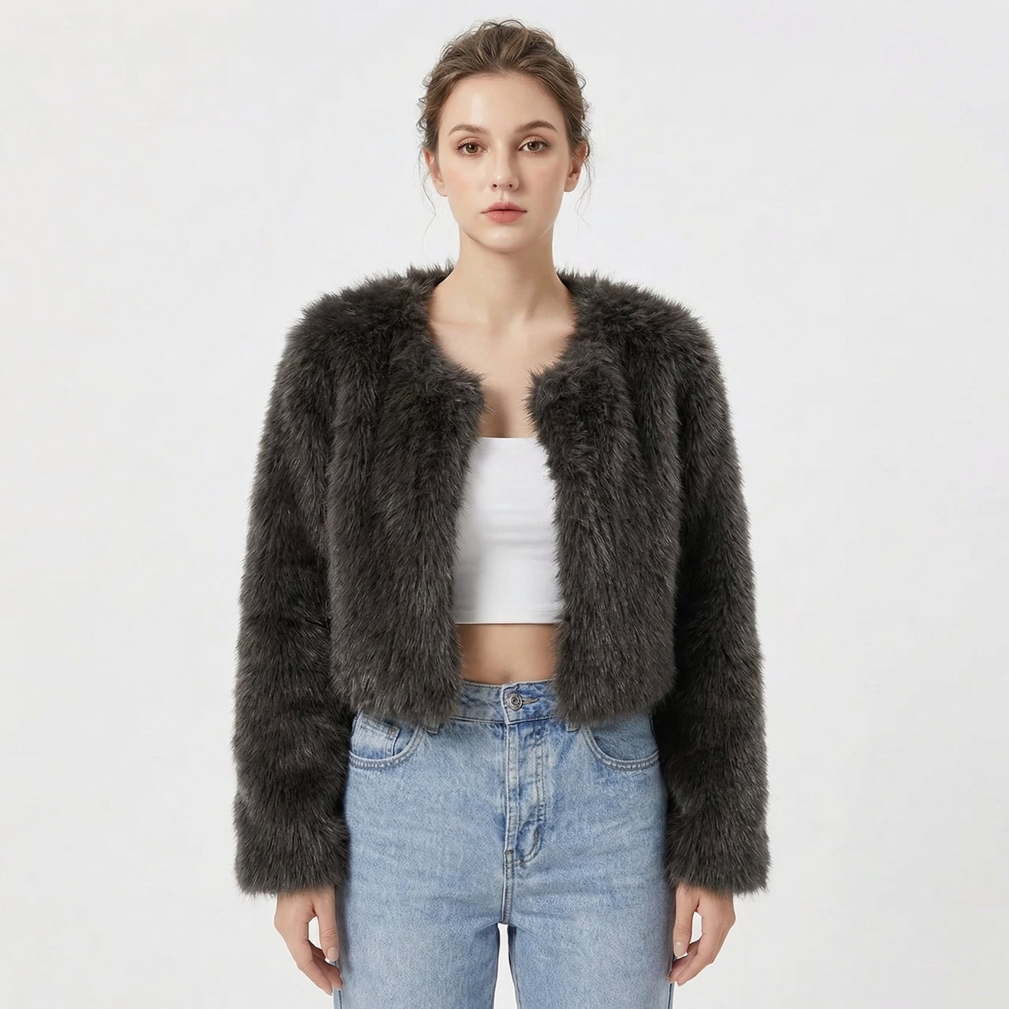 Women's faux fur jacket featuring a stylish cropped silhouette, perfect for adding a soft, lightweight layer to winter outfits, ideal for elegant evening wear. 1
