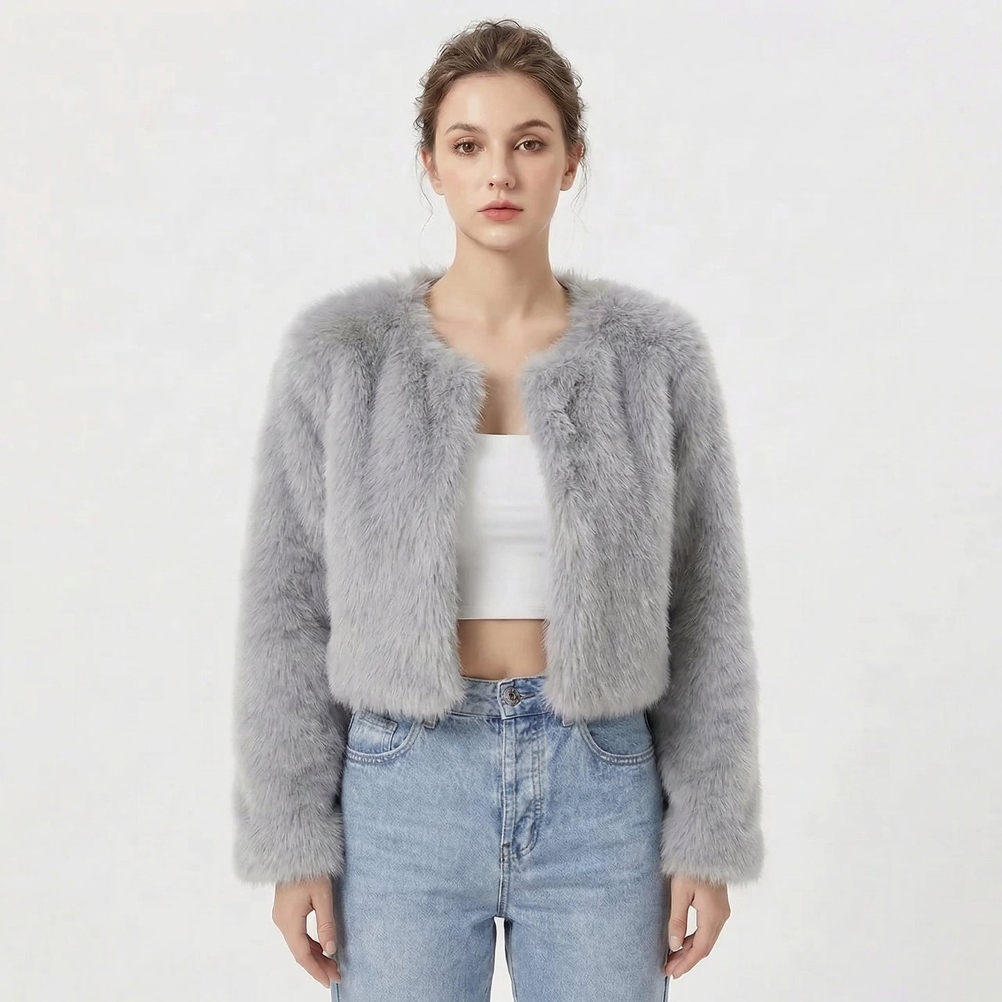 Women's faux fur jacket featuring a stylish cropped silhouette, perfect for adding a soft, lightweight layer to winter outfits, ideal for elegant evening wear. 2