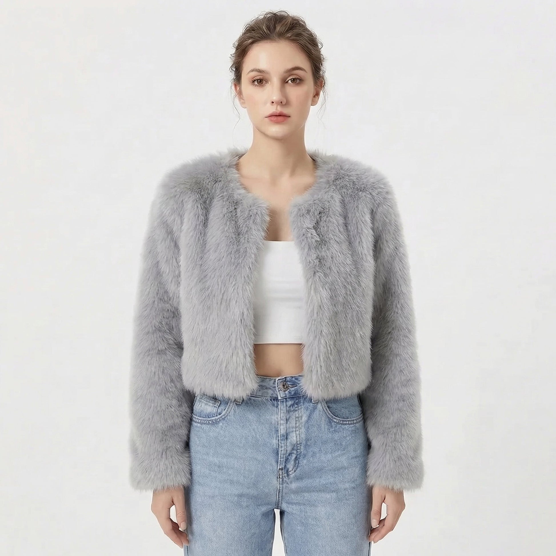 Women's faux fur jacket featuring a stylish cropped silhouette, perfect for adding a soft, lightweight layer to winter outfits, ideal for elegant evening wear. 2
