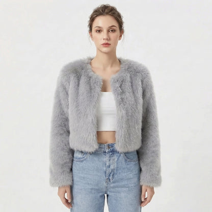 Women's faux fur jacket featuring a stylish cropped silhouette, perfect for adding a soft, lightweight layer to winter outfits, ideal for elegant evening wear. 2