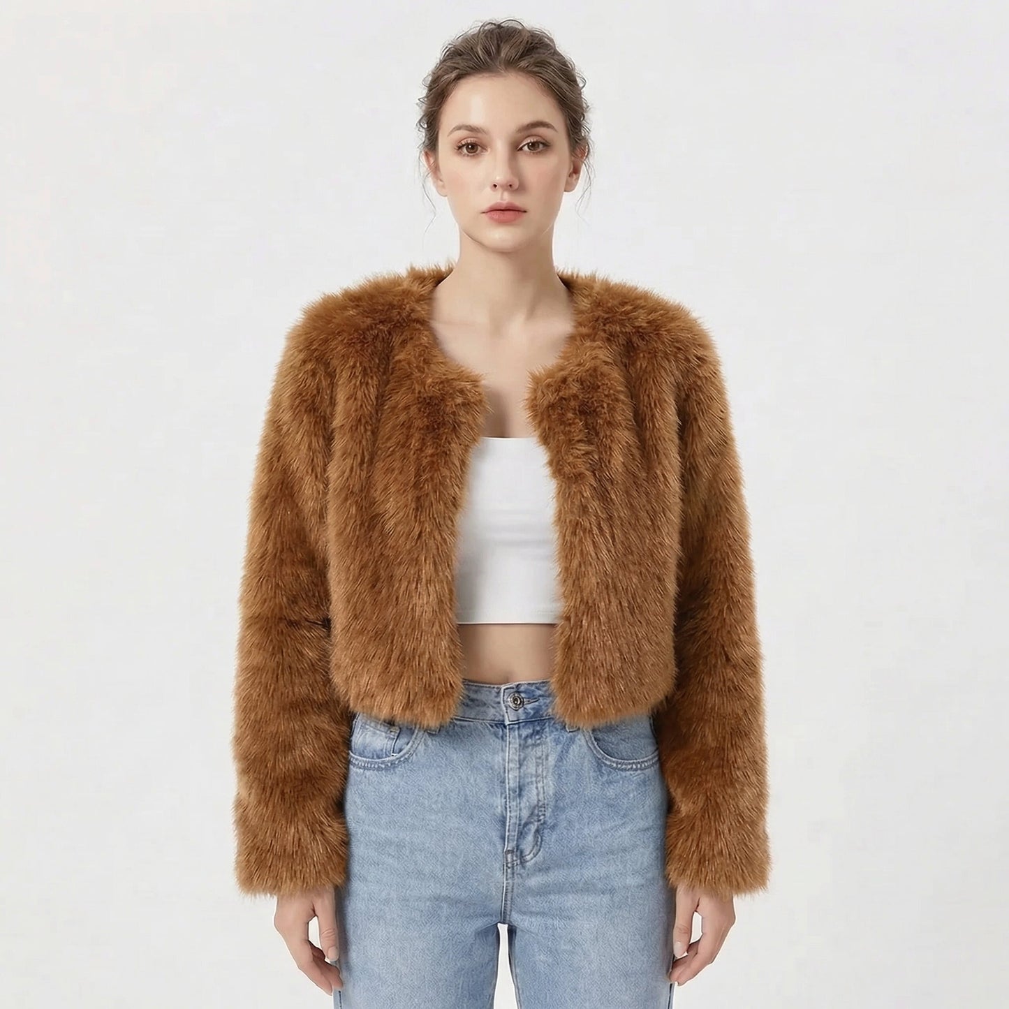 Women's faux fur jacket featuring a stylish cropped silhouette, perfect for adding a soft, lightweight layer to winter outfits, ideal for elegant evening wear. 3