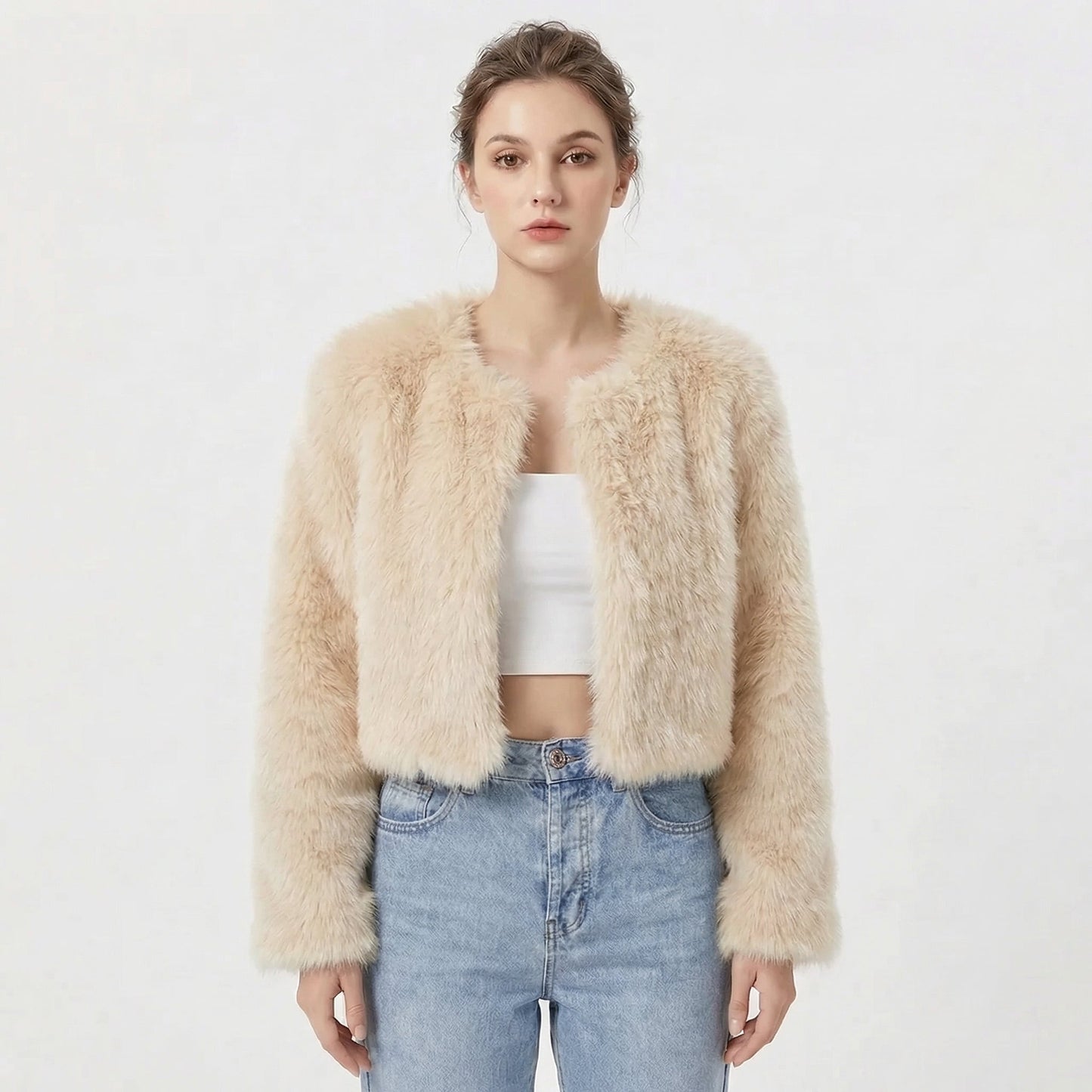 Women's faux fur jacket featuring a stylish cropped silhouette, perfect for adding a soft, lightweight layer to winter outfits, ideal for elegant evening wear. 4