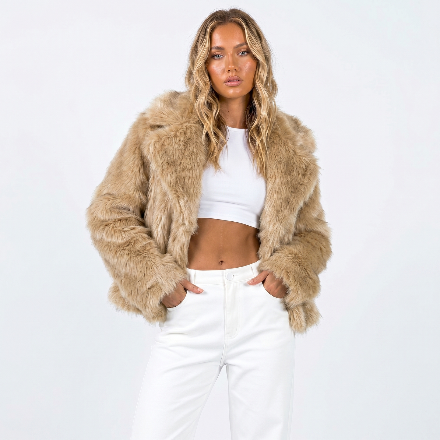 Women's faux fur jacket featuring an oversized collar, designed as a cropped winter coat suitable for casual and evening wear. 4