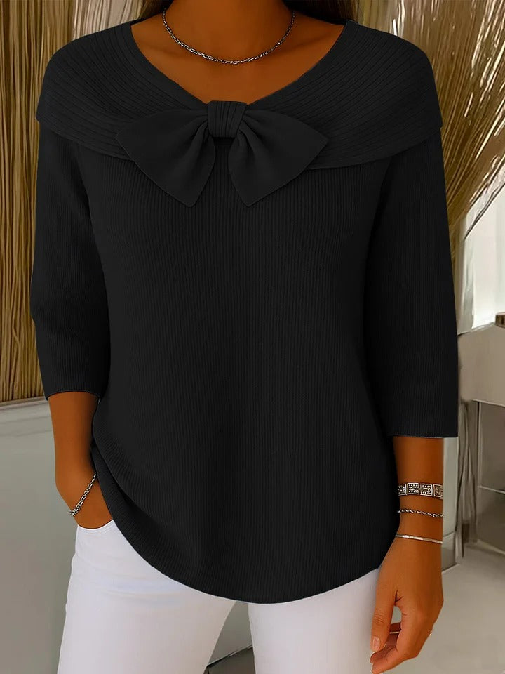 Women's fitted sweater with bow detail in soft fabric, featuring a cozy minimalist design perfect for an elegant autumn style. 5