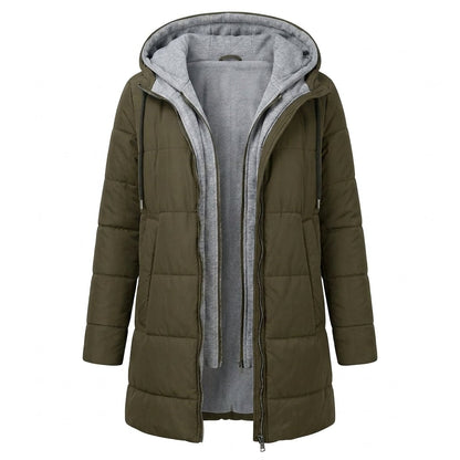 Women's longline quilted puffer jacket in black, featuring a zip front and practical pockets, ideal for cold weather wear. 5