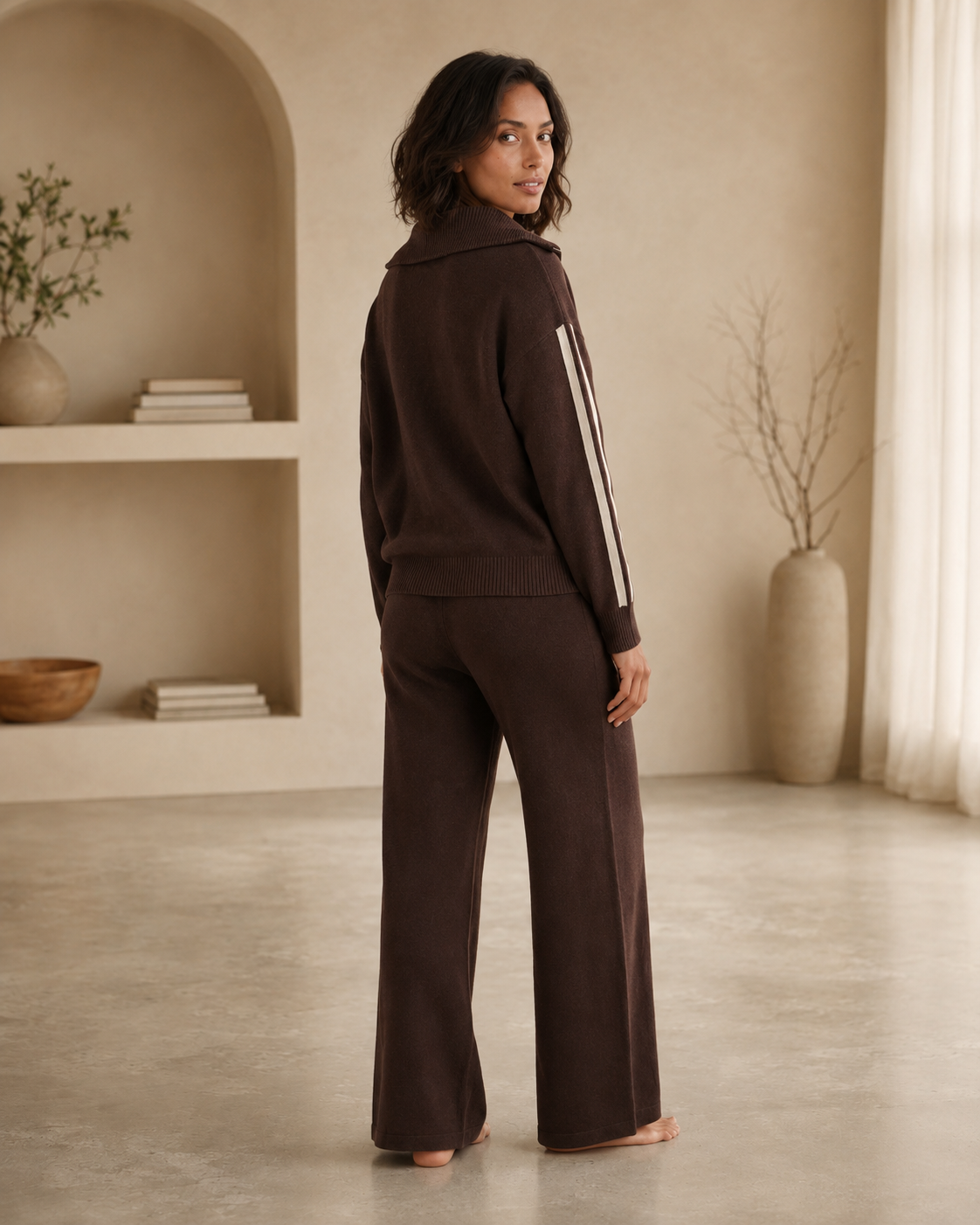 Women's loungewear set featuring a half-zip pullover and wide-leg trousers in comfortable chocolate brown stripes, perfect for relaxation and casual outings. 1
