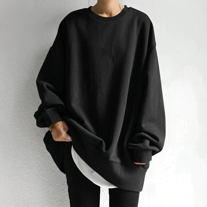 Women's oversized sweater tunic featuring long sleeves and a cozy drop shoulder design, perfect for casual comfort and stylish layering. 0