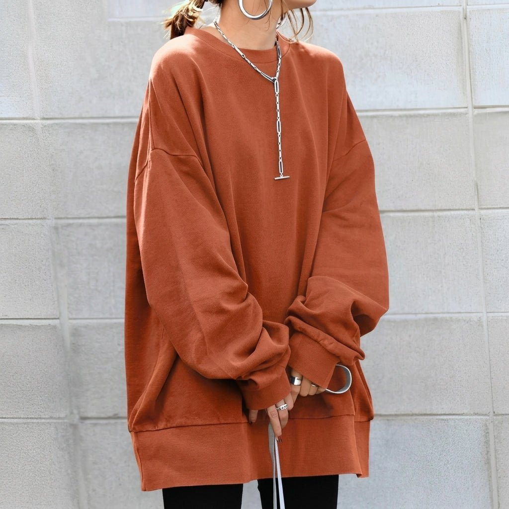 Women's oversized sweater tunic featuring long sleeves and a cozy drop shoulder design, perfect for casual comfort and stylish layering. 4