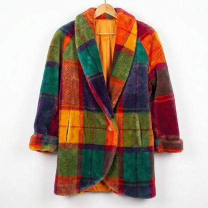 Women's oversized wool coat featuring a classic plaid design, perfect for winter style and warmth. 1