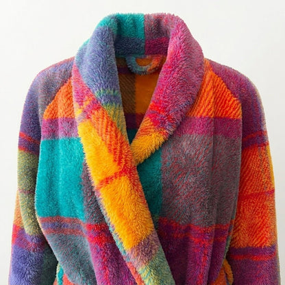 Women's oversized wool coat featuring a classic plaid design, perfect for winter style and warmth. 3