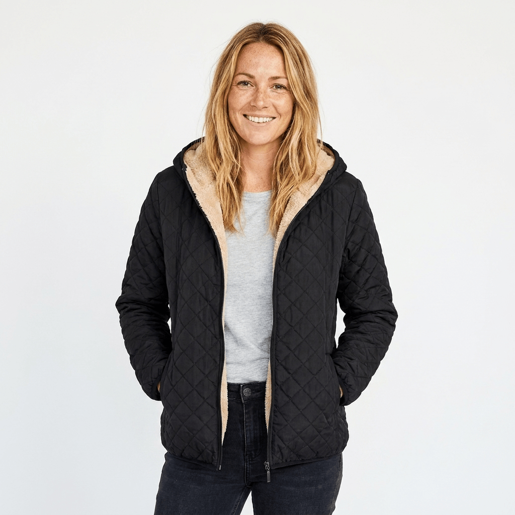 Women's quilted jacket featuring a fleece-lined hood and zip-up closure, designed for warmth and style, perfect for winter wear. 0