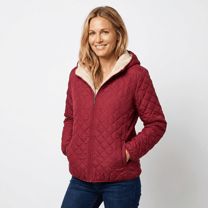 Women's quilted jacket featuring a fleece-lined hood and zip-up closure, designed for warmth and style, perfect for winter wear. 4