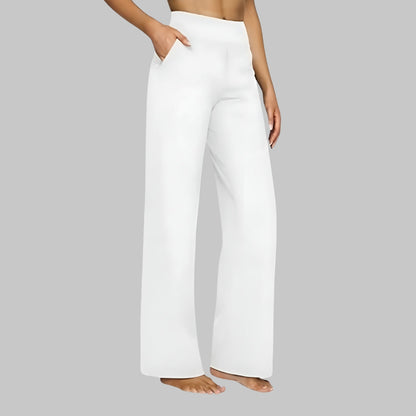 Women's stretch pants featuring a high waist design and deep pockets, crafted for comfort with wrinkle-free fabric, perfect for casual outings and workouts. 5
