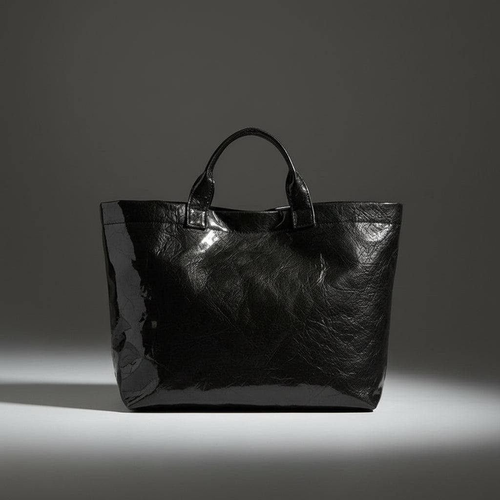 Women's structured tote bag made of durable synthetic leather, featuring spacious carry space and available in multiple colors, ideal for everyday use and stylish outings. 1