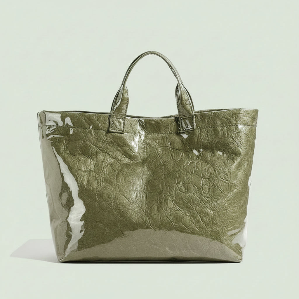 Women's structured tote bag made of durable synthetic leather, featuring spacious carry space and available in multiple colors, ideal for everyday use and stylish outings. 2