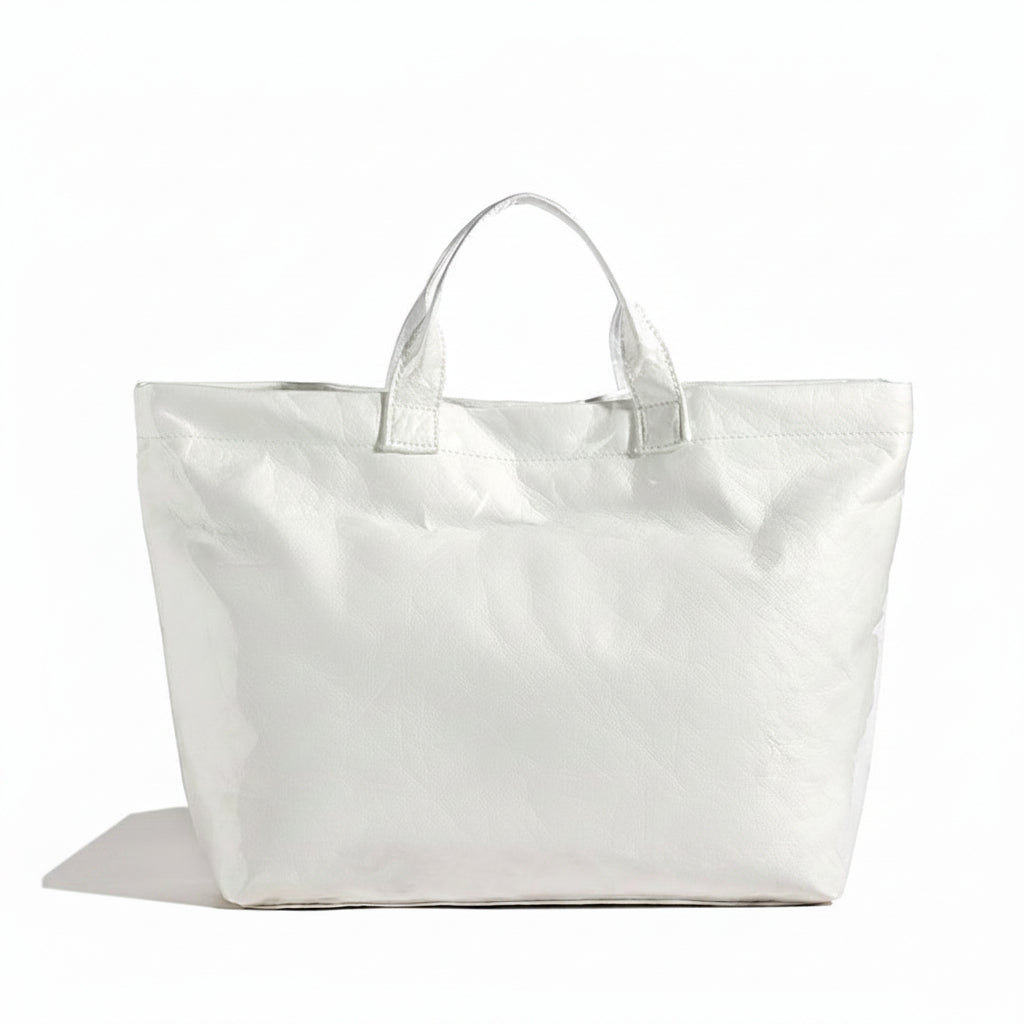 Women's structured tote bag made of durable synthetic leather, featuring spacious carry space and available in multiple colors, ideal for everyday use and stylish outings. 3