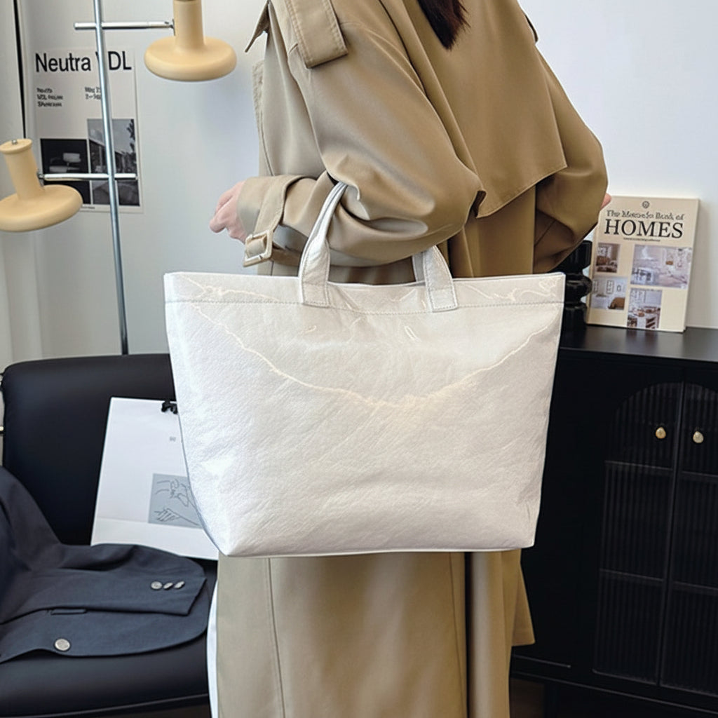 Women's structured tote bag made of durable synthetic leather, featuring spacious carry space and available in multiple colors, ideal for everyday use and stylish outings. 6