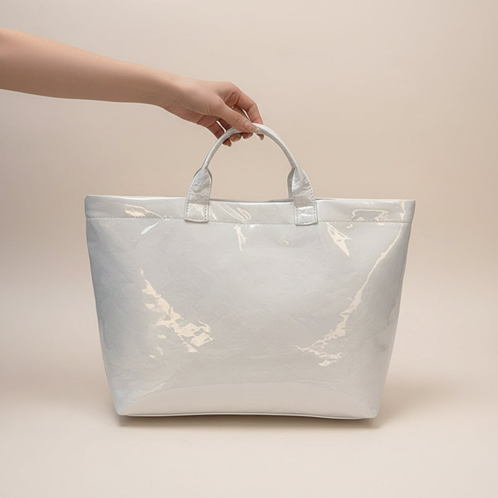 Women's structured tote bag made of durable synthetic leather, featuring spacious carry space and available in multiple colors, ideal for everyday use and stylish outings. 7