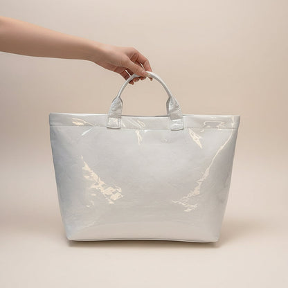 Women's structured tote bag made of durable synthetic leather, featuring spacious carry space and available in multiple colors, ideal for everyday use and stylish outings. 7