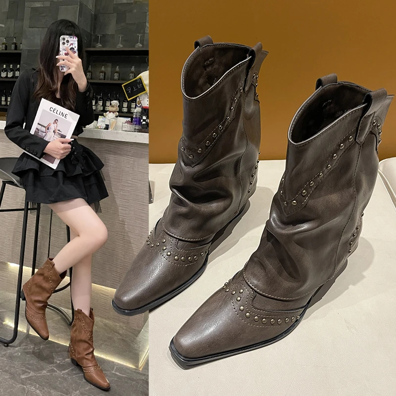 Black women's studded cowboy boots featuring mid-heel and metallic accents, showcasing a stylish Western-inspired design perfect for fashionable outfits. 3
