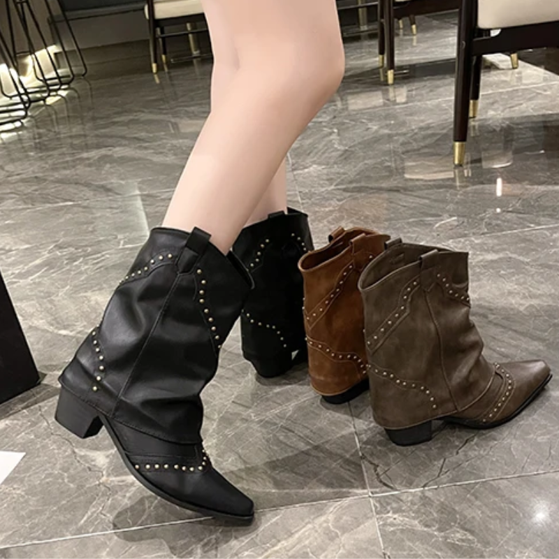 Black women's studded cowboy boots featuring mid-heel and metallic accents, showcasing a stylish Western-inspired design perfect for fashionable outfits. 5