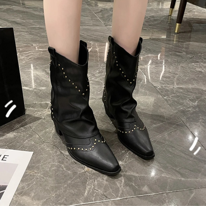Black women's studded cowboy boots featuring mid-heel and metallic accents, showcasing a stylish Western-inspired design perfect for fashionable outfits. 6