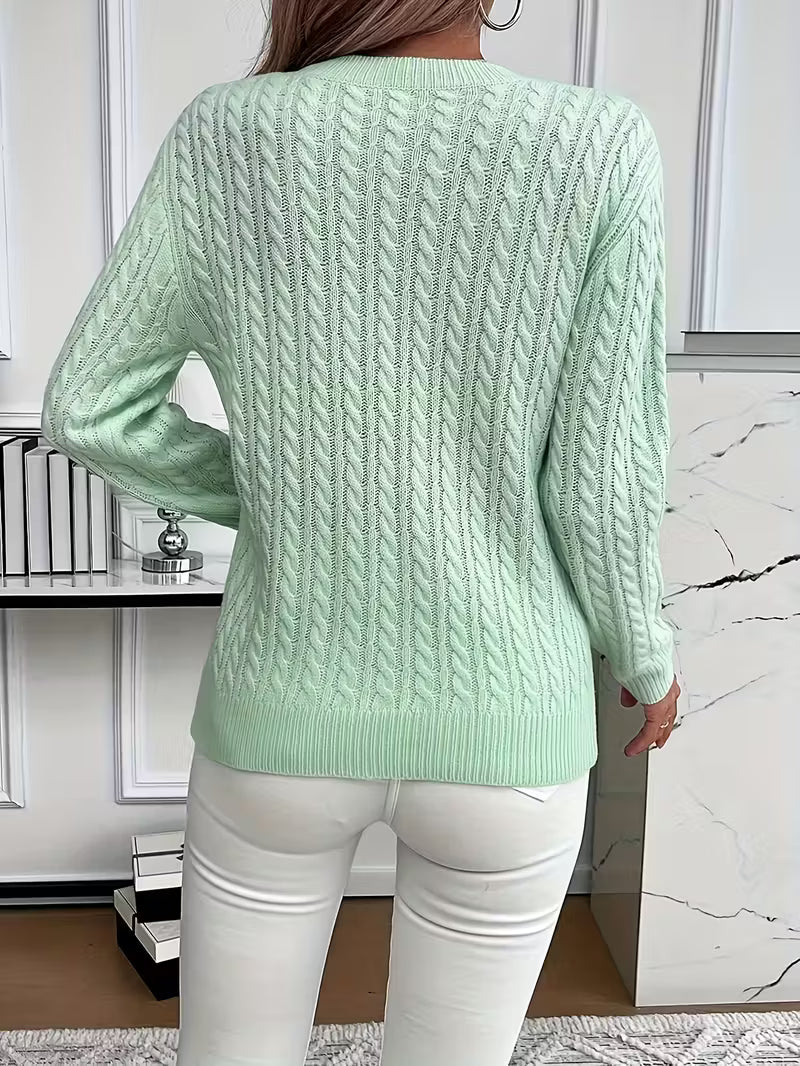Women's green sweater designed for cozy everyday wear, featuring a minimalist lightweight design perfect for layering and casual outfits. 3