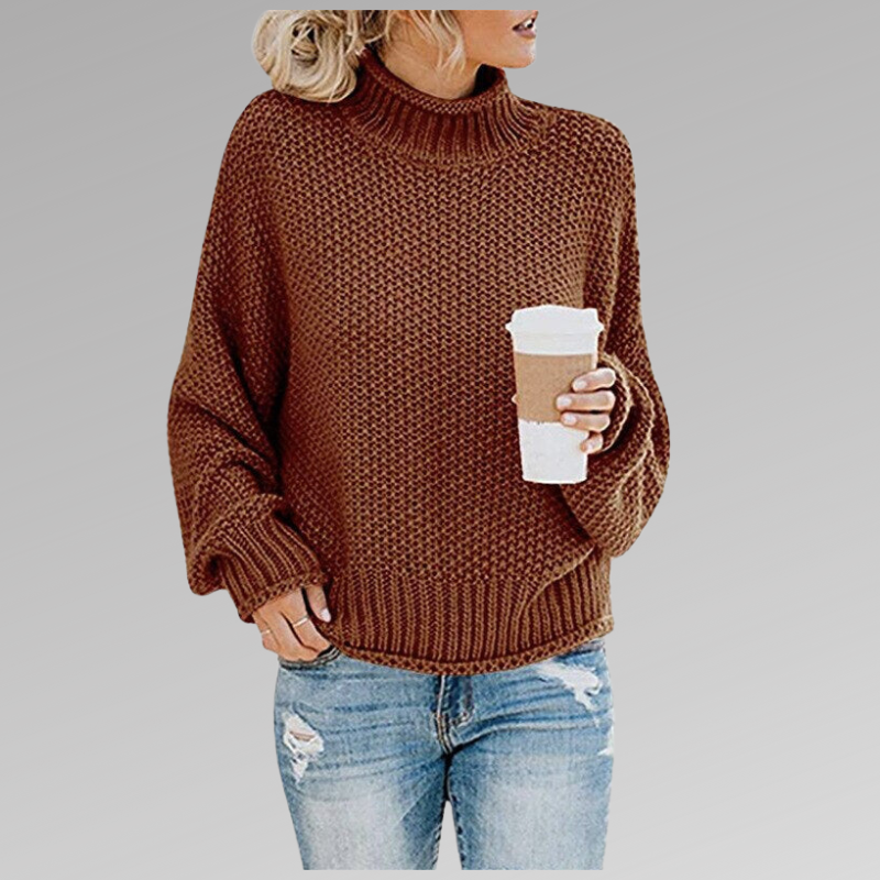 Women's orange high-neck sweater featuring a soft cozy knit and draped fit, perfect for stylish layering in cooler weather. 3