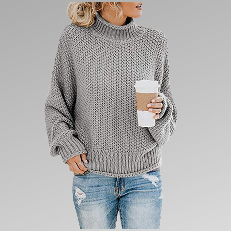 Women's orange high-neck sweater featuring a soft cozy knit and draped fit, perfect for stylish layering in cooler weather. 4